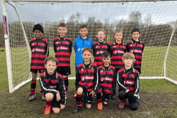 image shows the Hindley Town Under 8 Gladiators football team.