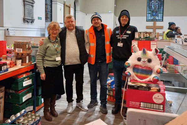 Scott and Darren from DASCO construction donating food and gifts the The Brick Christmas appeal