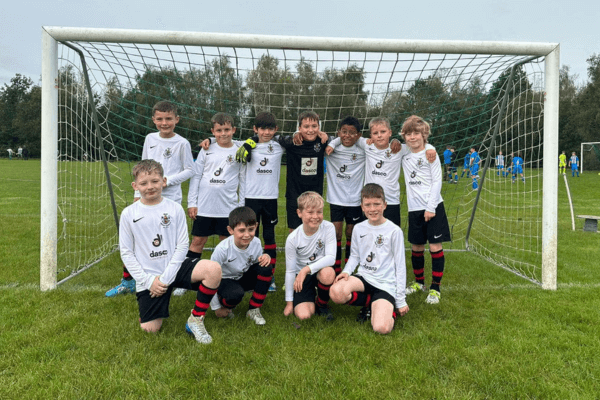 U9's Gladiators from Hindley Town FC pictured in their goal