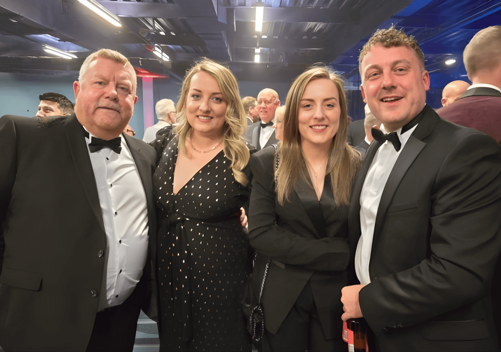 The team from DASCO Construction smiling at the camera