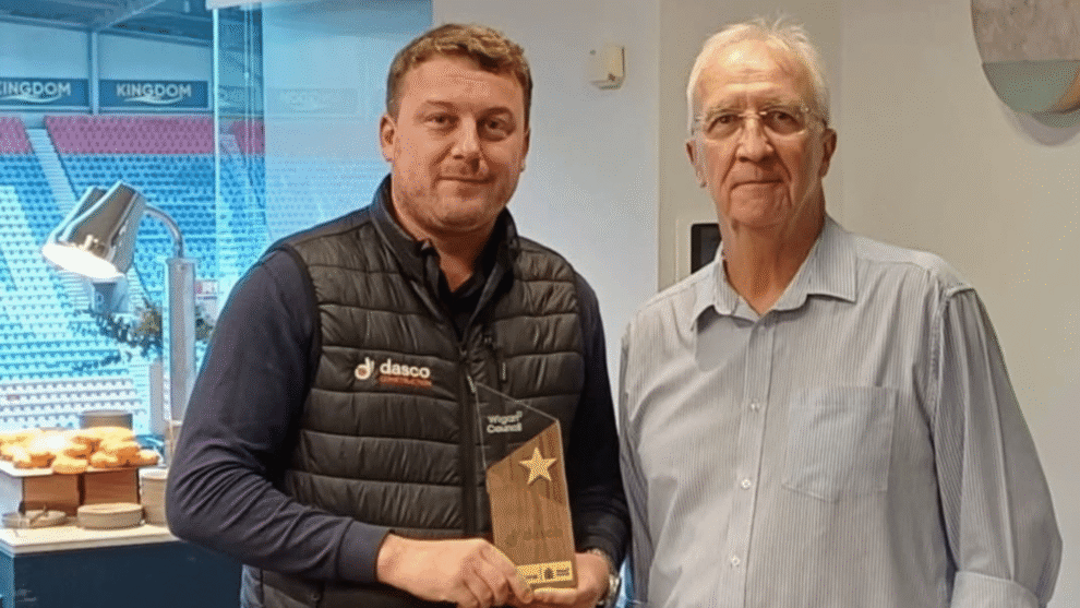 Scott Rothwell with Councillor David Moleneux presenting Believe in Business Charter Gold for DASCO Construction