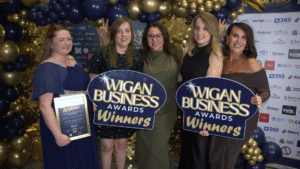 DASCO Constructions women posing with their Wigan Business Awards